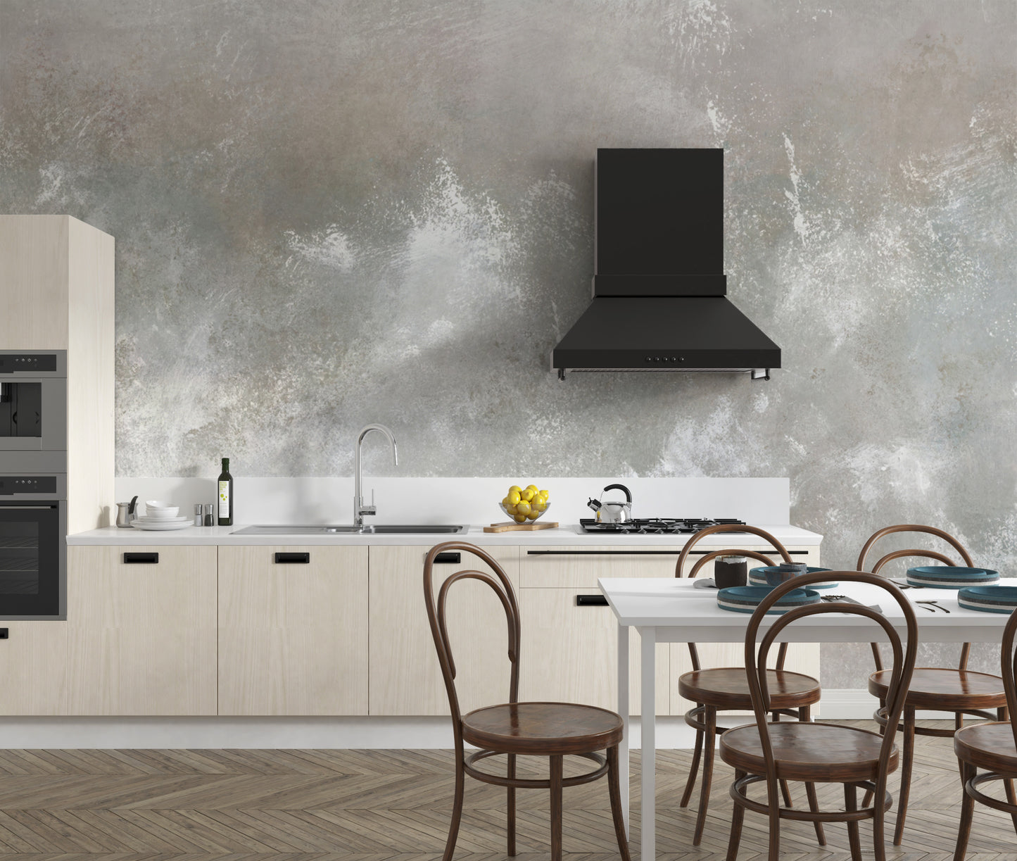 Baltic Sand Textured Abstract wallpaper mural in grey behind cream cabinets and a black range hood in a kitchen