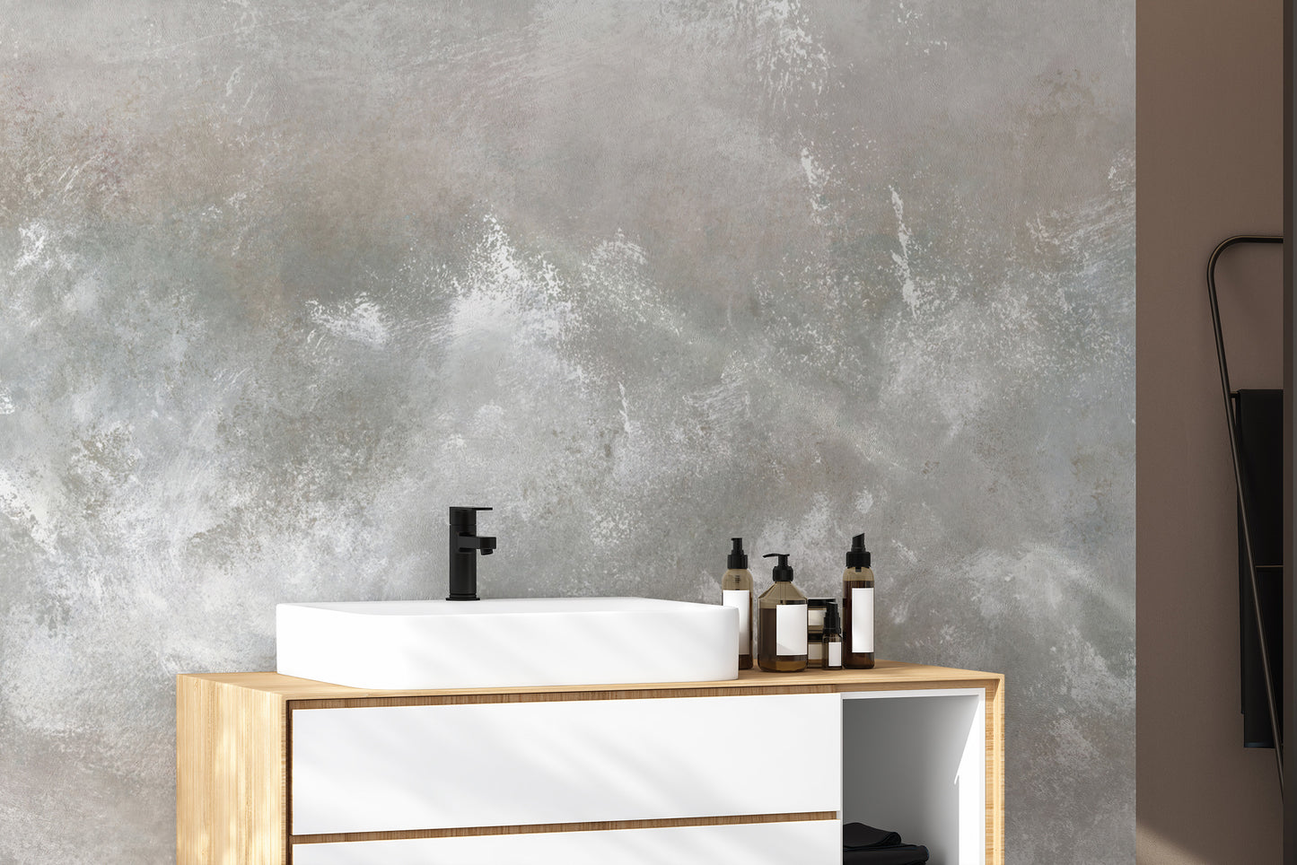 Baltic Sand Textured Abstract wallpaper mural in grey behind a white vessel sink on a wood vanity in a bathroom