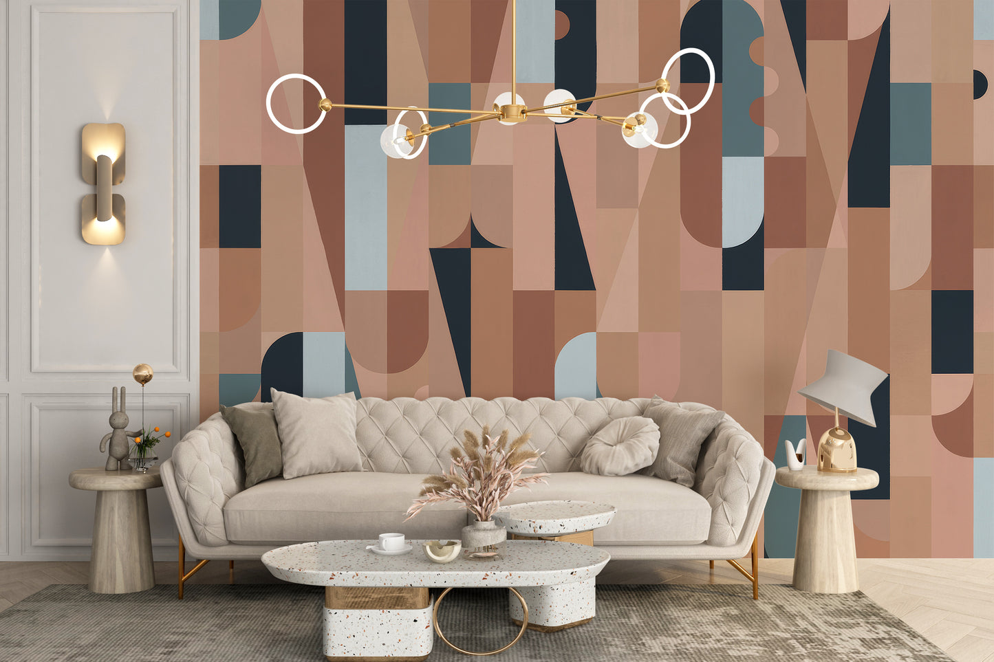 Chromatic Puzzle Wall mural in earthy geometric shapes behind a cream tufted sofa in a living room