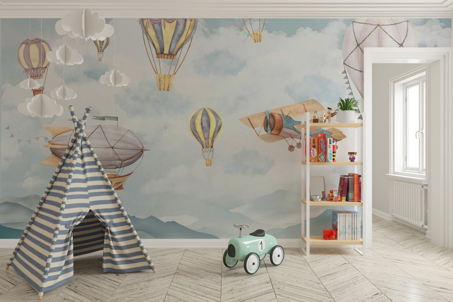 Cloud Drifter Airships Wall mural of pastel balloons in a kids room with a striped teepee and toy car