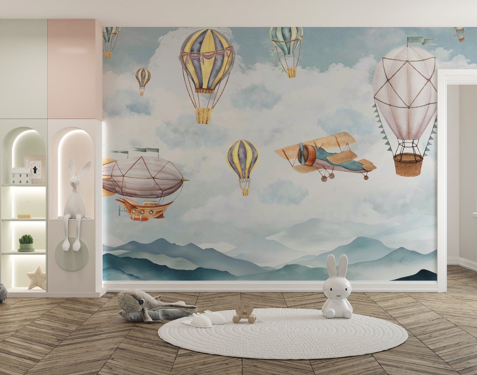 Cloud Drifter Airships Wall mural of pastel hot-air balloons and airships in a kids room with a round rug
