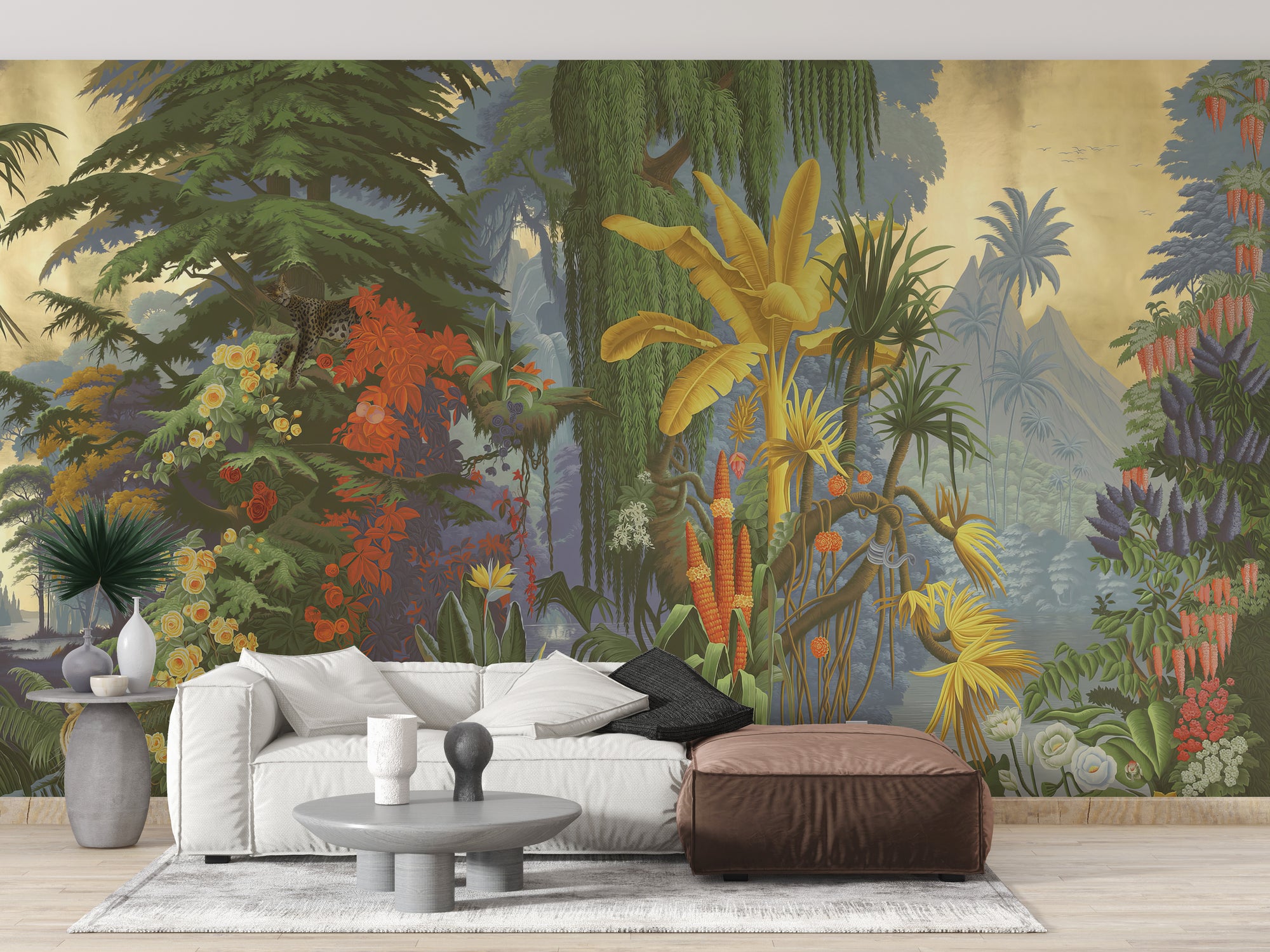 Vibrant Jungle wallpaper mural with yellow banana palms and red blooms behind a white sofa in a living room