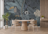 Tropical Toucan wall mural featuring a toucan in dark jungle foliage behind a round dining table and beige chairs