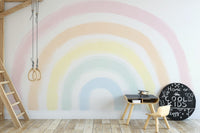 Create a fairy-tale vibe with a Pastel Rainbow Mural in kids rooms