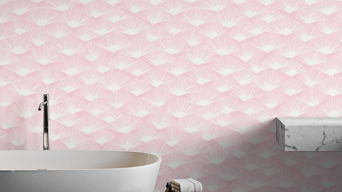 Tropical Blush Fanfare wallpaper with soft pink palm patterns.
