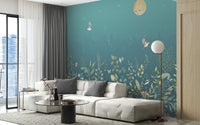 Twilight Flutters wallpaper mural with moon, birds and plants behind a cream sectional sofa in a living room