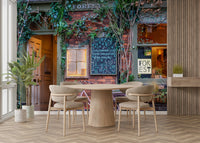 The wallpaper is used as a feature wall in a bedroom.

