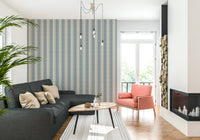 Soft stripe wallpaper in nautical colors for a peaceful, seaside-inspired interior.
