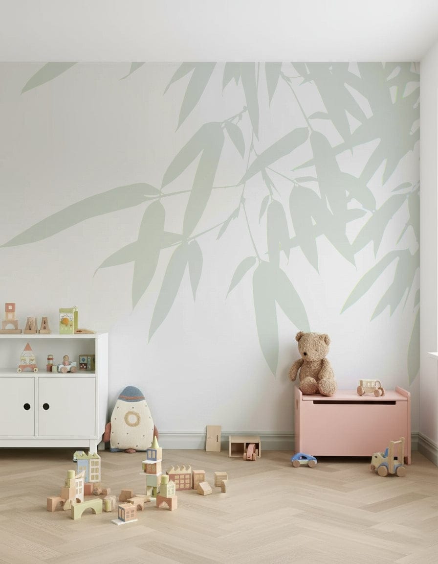 Subtle bamboo foliage spread across a pale backdrop forming a soothing nature-inspired wallpaper.