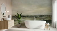 Coastal Hues wallpaper mural of a green shoreline beside a blush wall behind a white tub in a modern bathroom