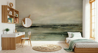 Coastal Hues wallpaper mural of an olive coastal scene behind a single bed and wood desk in a teen bedroom