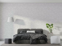 The colors are gentle and lush, with a natural, green and gray palette.

