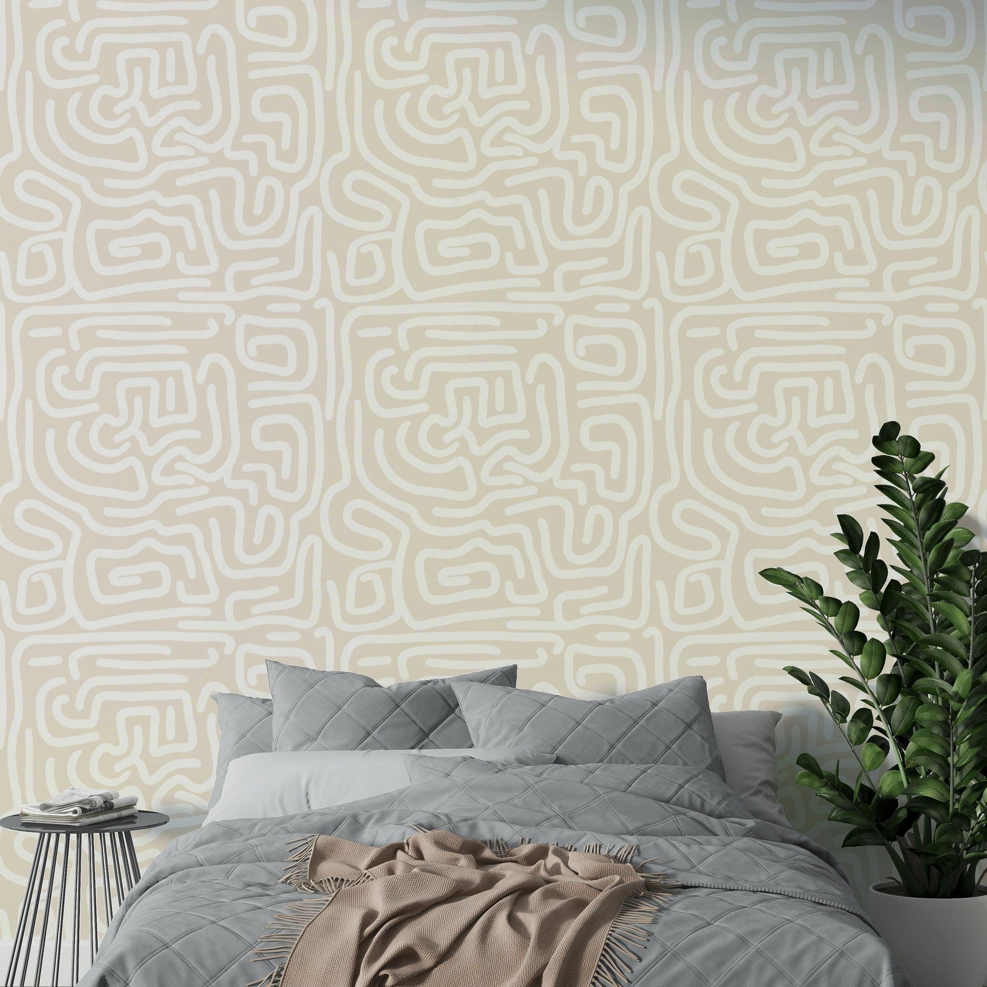 A full-wall mural showing a subtle maze pattern.
