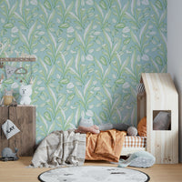 The design is a dense, overlapping pattern of tropical foliage.
