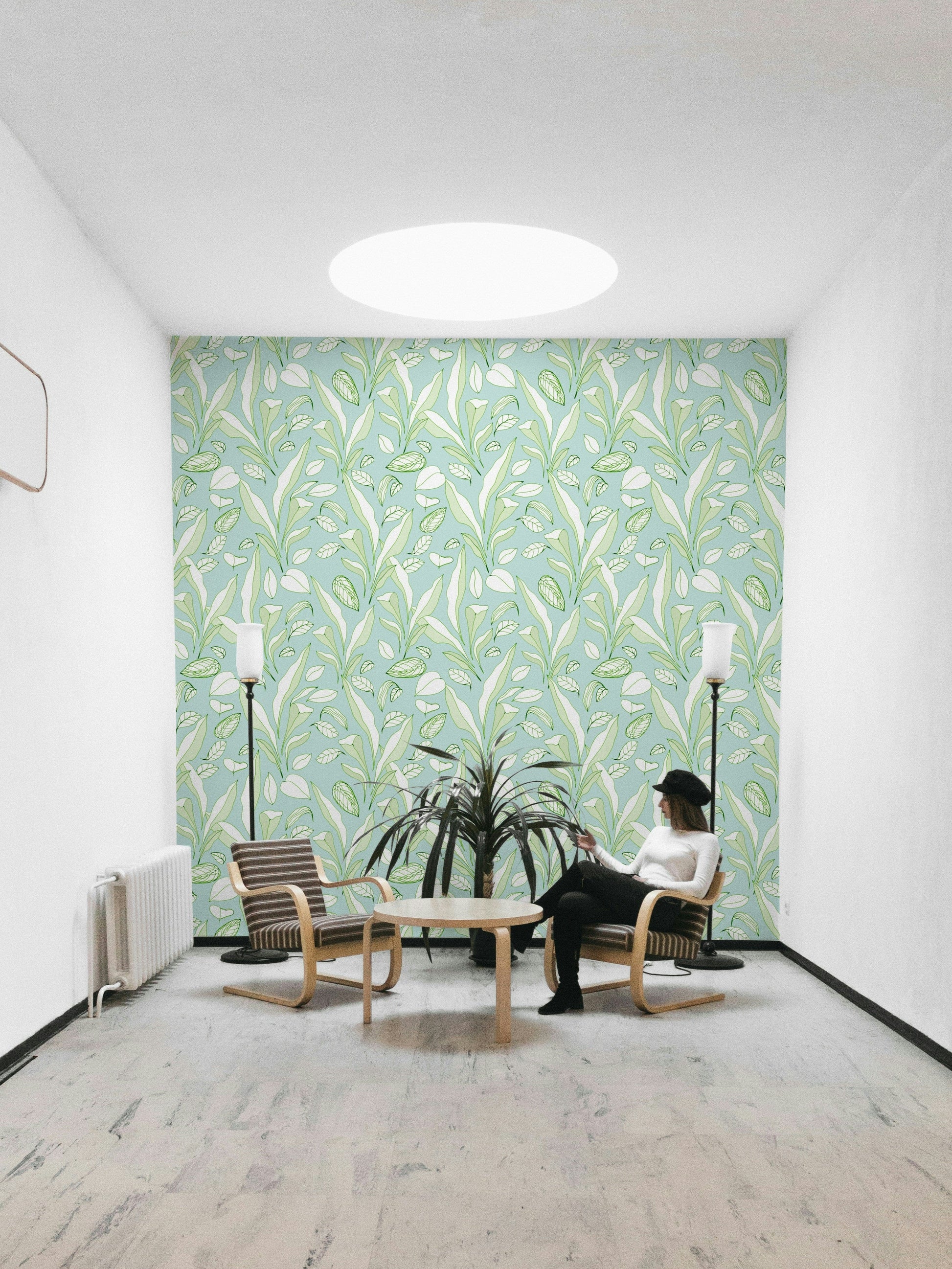 The color palette consists of various shades of green.
