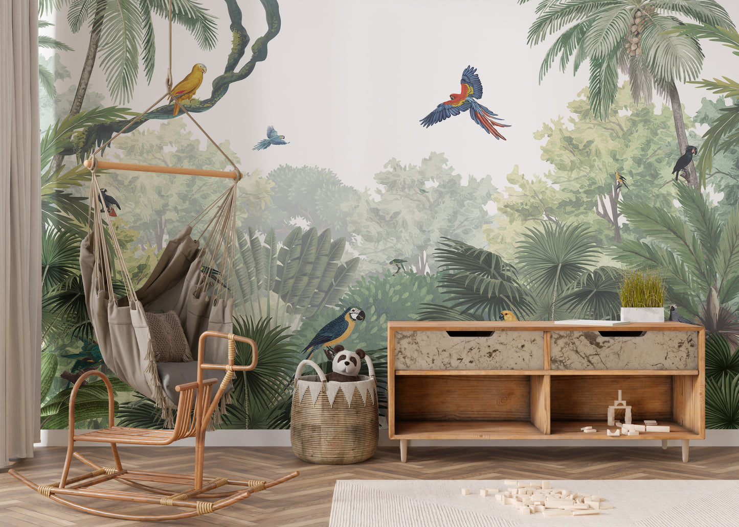 Canopy Jungle Natural Tropical wallpaper mural behind a rattan hanging swing chair and wooden sideboard