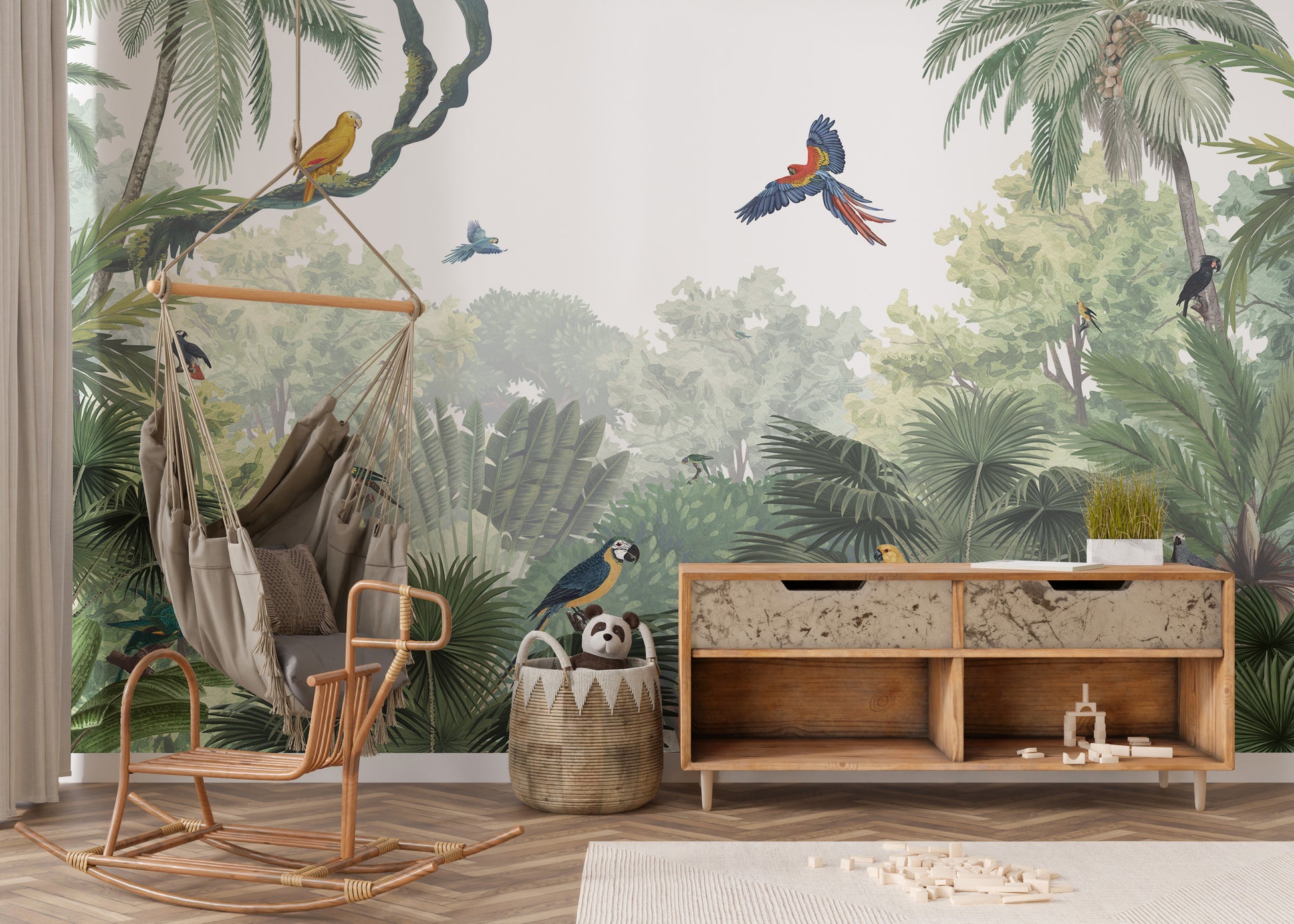 Canopy Jungle Natural Tropical wallpaper mural behind a rattan hanging swing chair and wooden sideboard