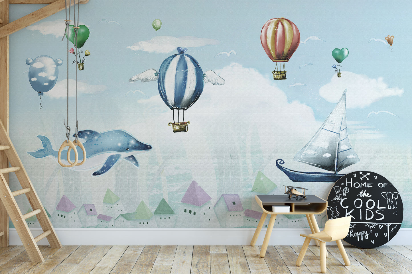 Hot Air Balloon Kids Room wallpaper mural styled as a feature wall behind a dining table and chairs in a multicolour palette