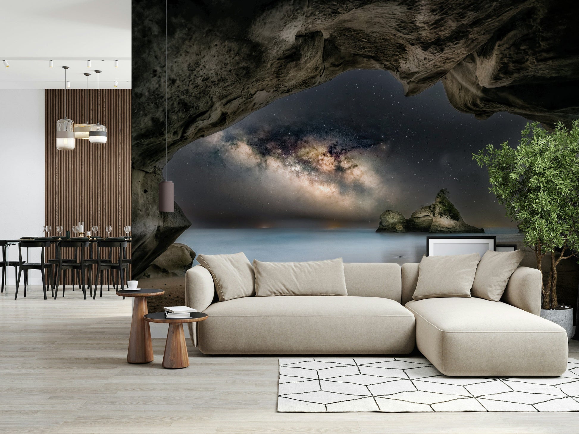 Cave Portal to Starlight wallpaper mural of a starry cave view behind a beige sectional in an open living room