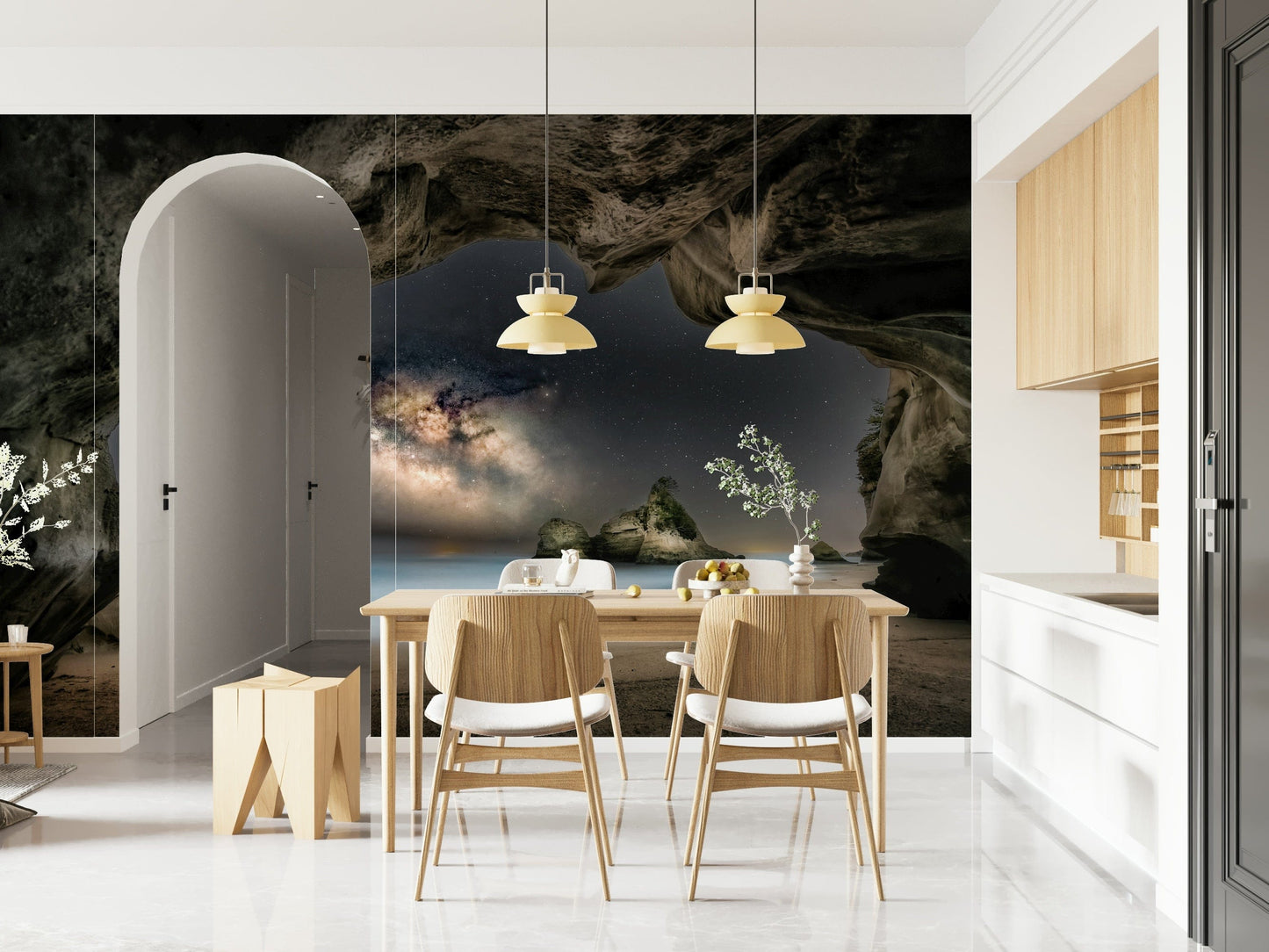 Cave Portal to Starlight wallpaper mural of a starry cave view behind a wood dining table in a bright kitchen