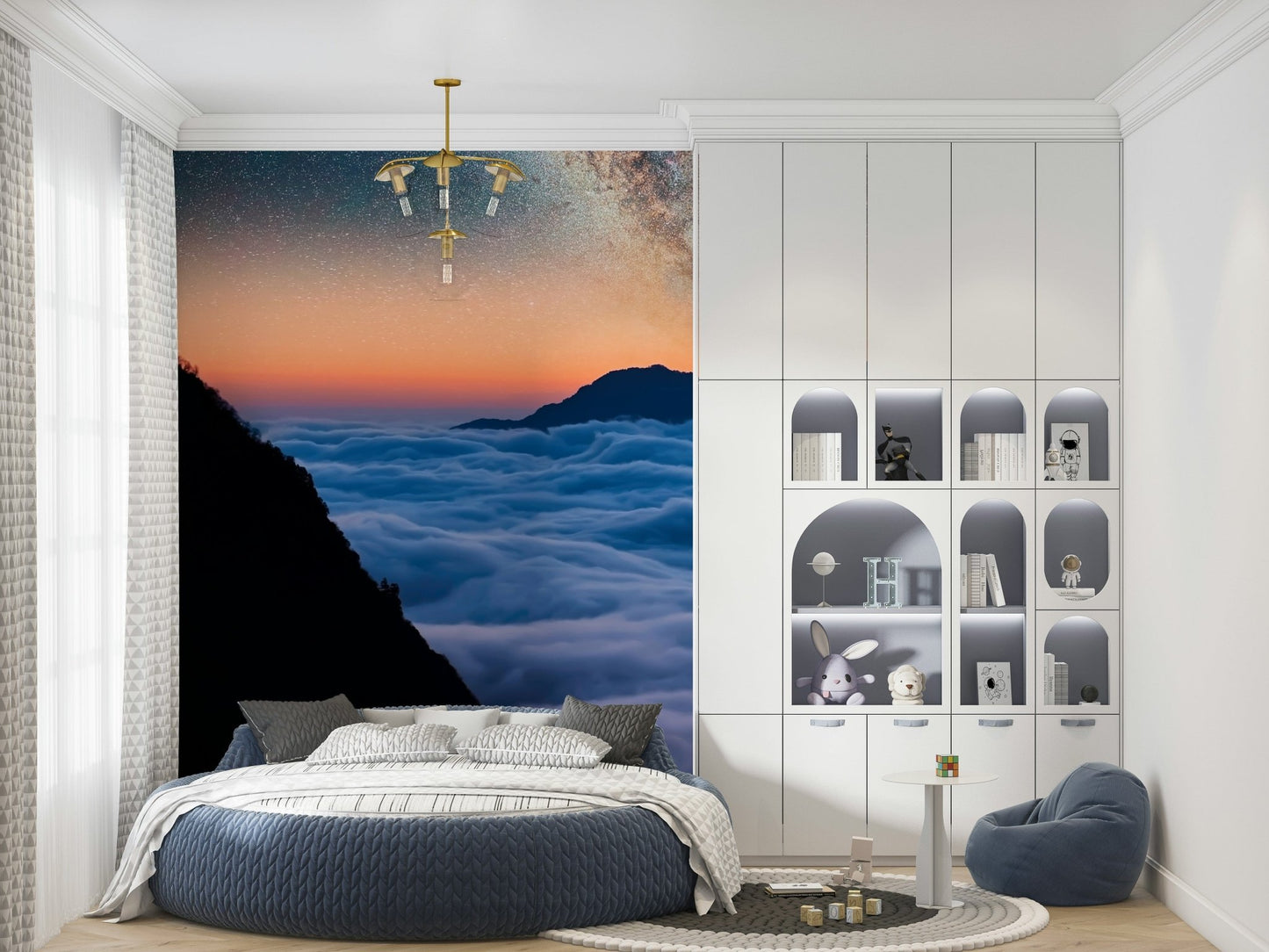 Wide valley mural showing misty mountains and open sky tones, gentle cloud wallpaper style
