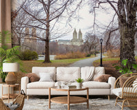 City’s Nature Vista Wall Mural behind sofa in apartment lounge, modern wall decor, muted greens