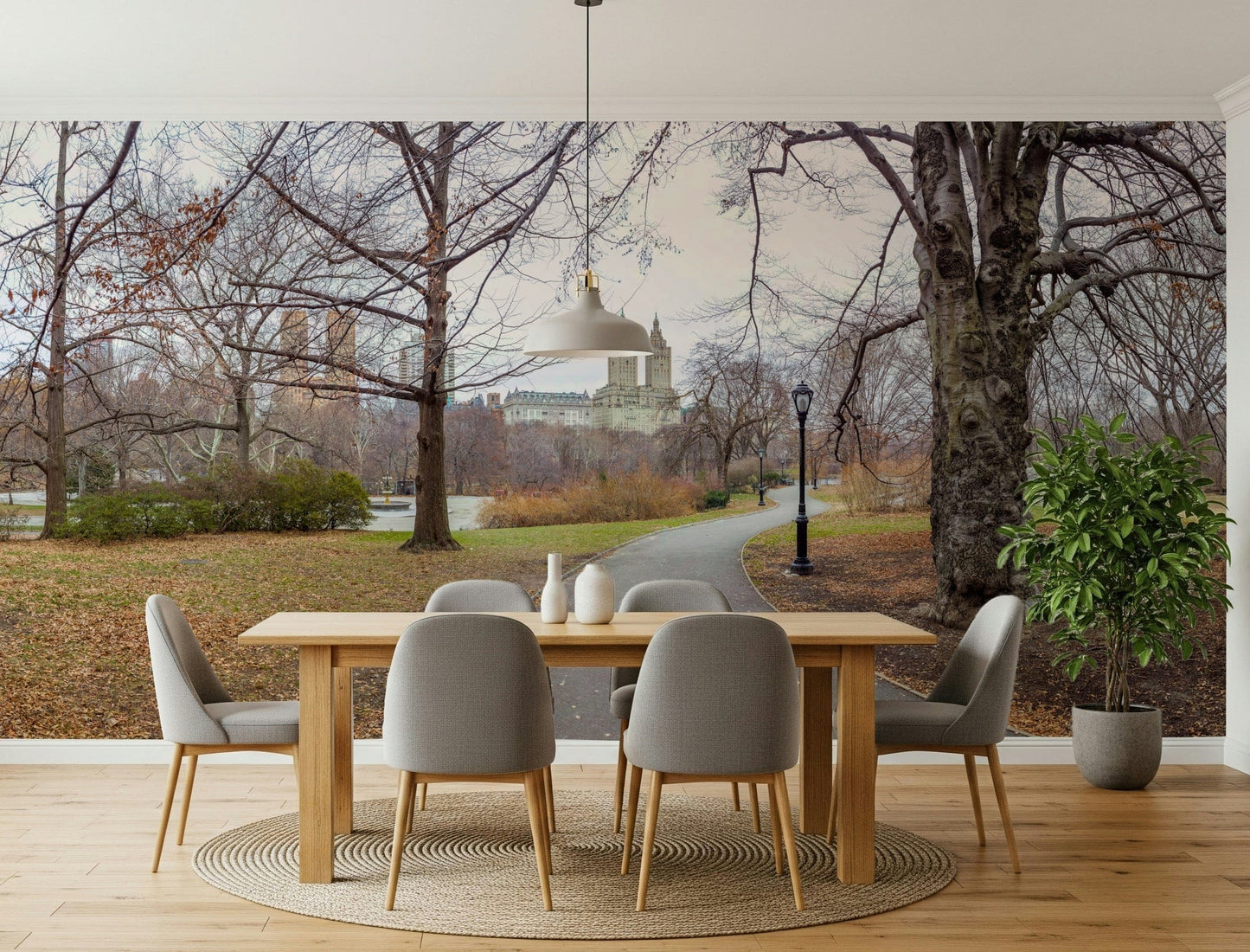Cityscape with foliage mural on hallway feature wall, modern apartment decor, soft greens