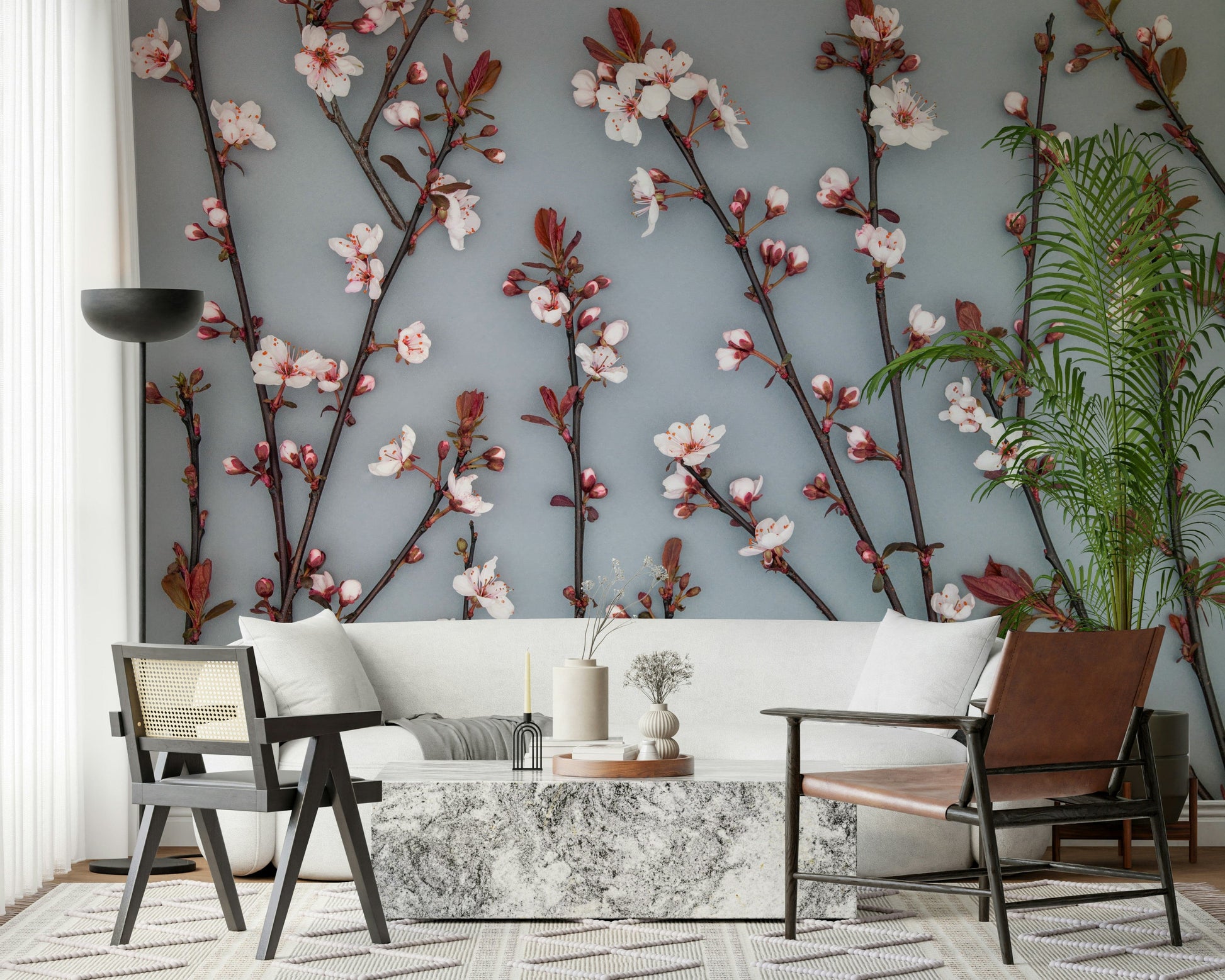 A botanical wallpaper highlighting cherry plant branches bursting with fresh spring blooms.