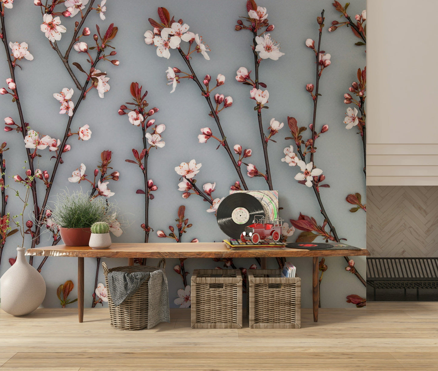 The wallpaper captures cherry blossoms with crisp detailing and warm reddish-brown stems.