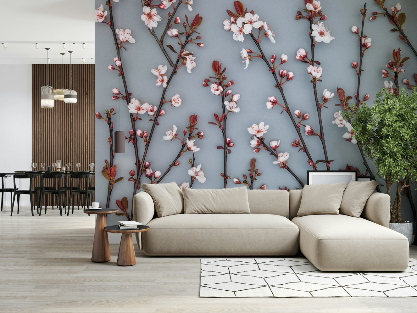 This wallpaper features ornamental cherry branches filled with soft pink blossoms against a muted blue backdrop.