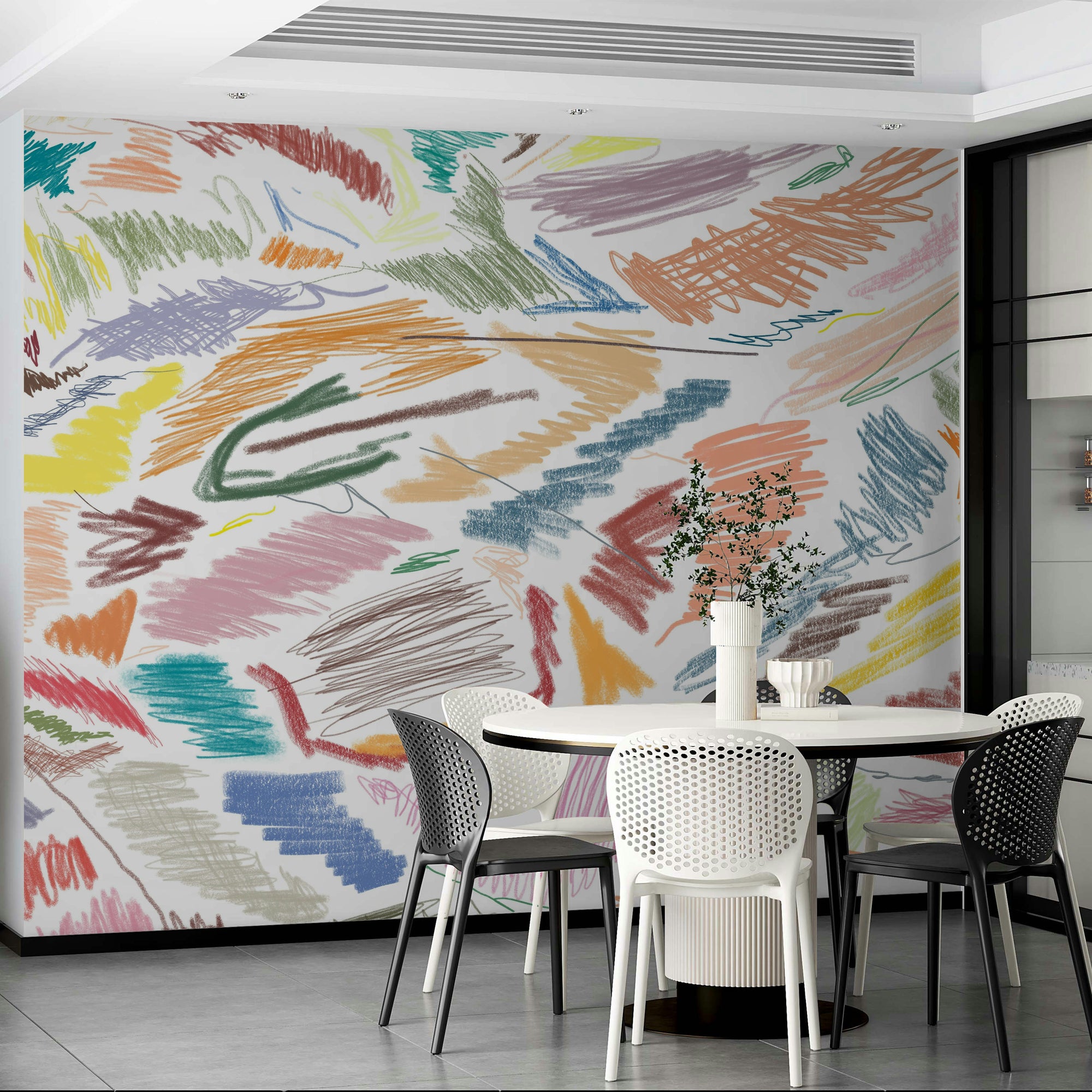 Cianfrusaglia V3 wallpaper mural of colorful crayon strokes behind a white round table and black and white chairs