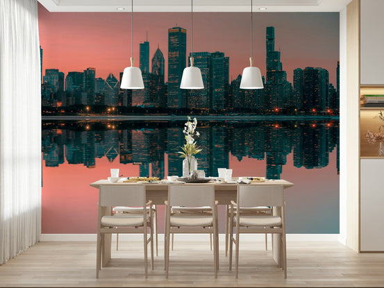 City Lights Reflected wallpaper mural with pink-sky Chicago skyline behind a wood dining table and pendant lights