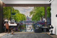 City of Bikes Wall Mural showing colorful bicycles along an Amsterdam canal.

