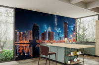 A beautiful modern art wall mural of a city at night.

