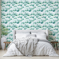 Snow-covered trees on vintage green background

