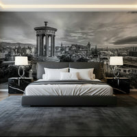 Classical City Charm wallpaper mural of black-and-white Edinburgh skyline and monument behind a grey bed with black marble nightstands