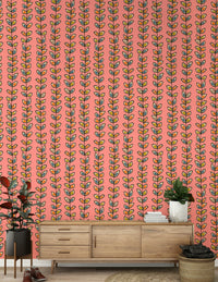 A pink retro leaves wallpaper featuring vertical climbing vines with colorful hand-drawn leaves.