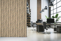 A cream wallpaper decorated with repeating vertical vines and bold outlined retro-style leaves.