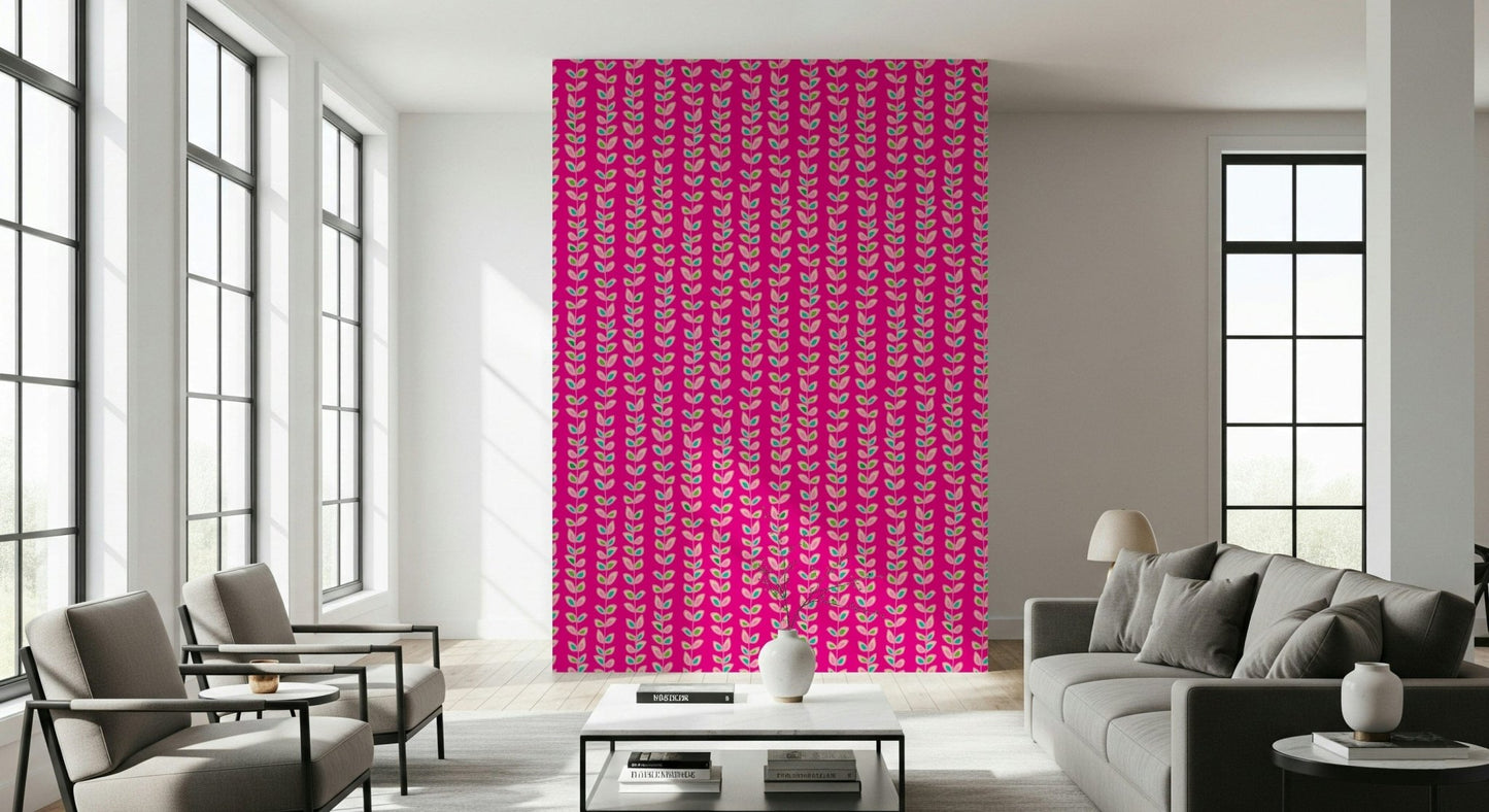 A bold retro leaf wallpaper with colorful vine patterns popping against a hot-pink backdrop.