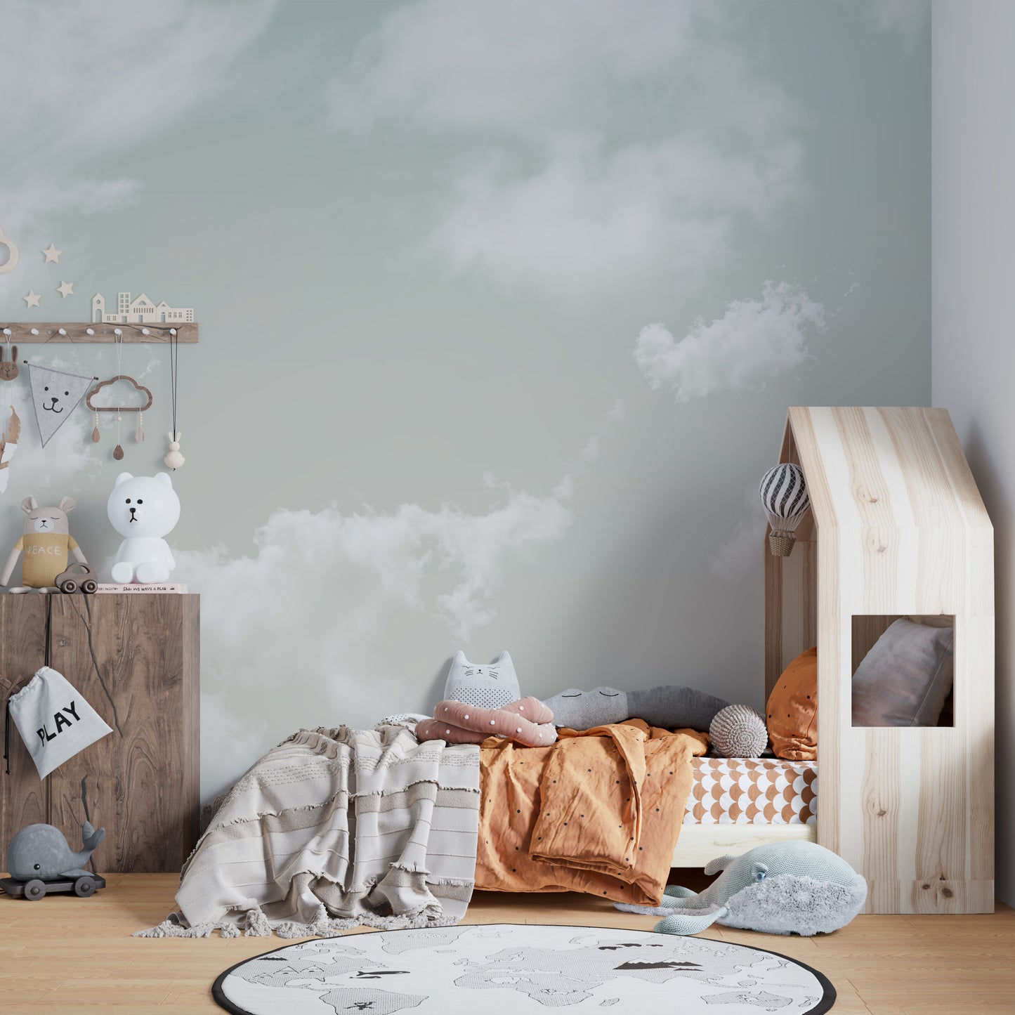 Installation process photograph: applying the seamless decorative cloud wallpaper.
