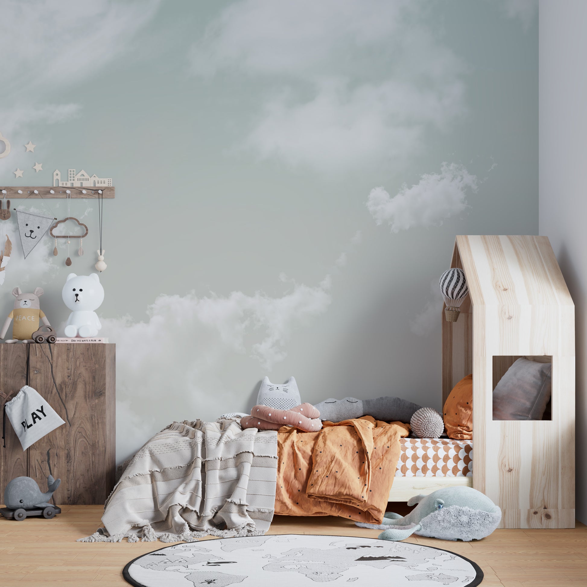 Installation process photograph: applying the seamless decorative cloud wallpaper.