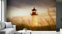 Minimal living room with lighthouse sunset wallpaper mural.