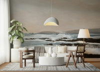 Coastal Hues wallpaper mural of a soft seascape behind a cream sofa and grey dome pendant in a living room