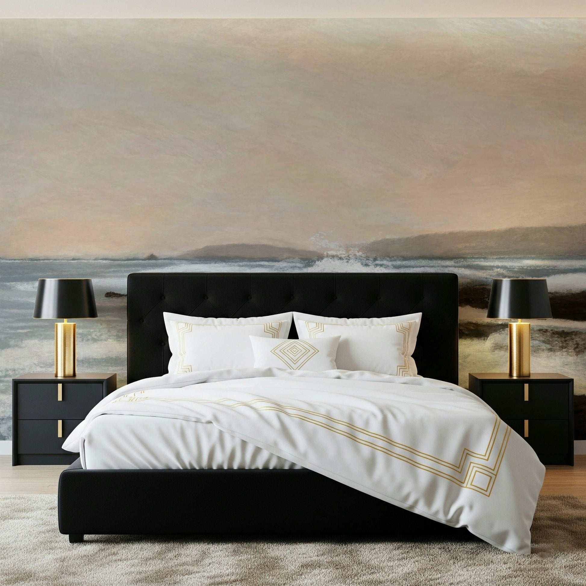 Coastal Hues wallpaper mural of a calm shore behind a black headboard bed with gold-trim bedding in a bedroom