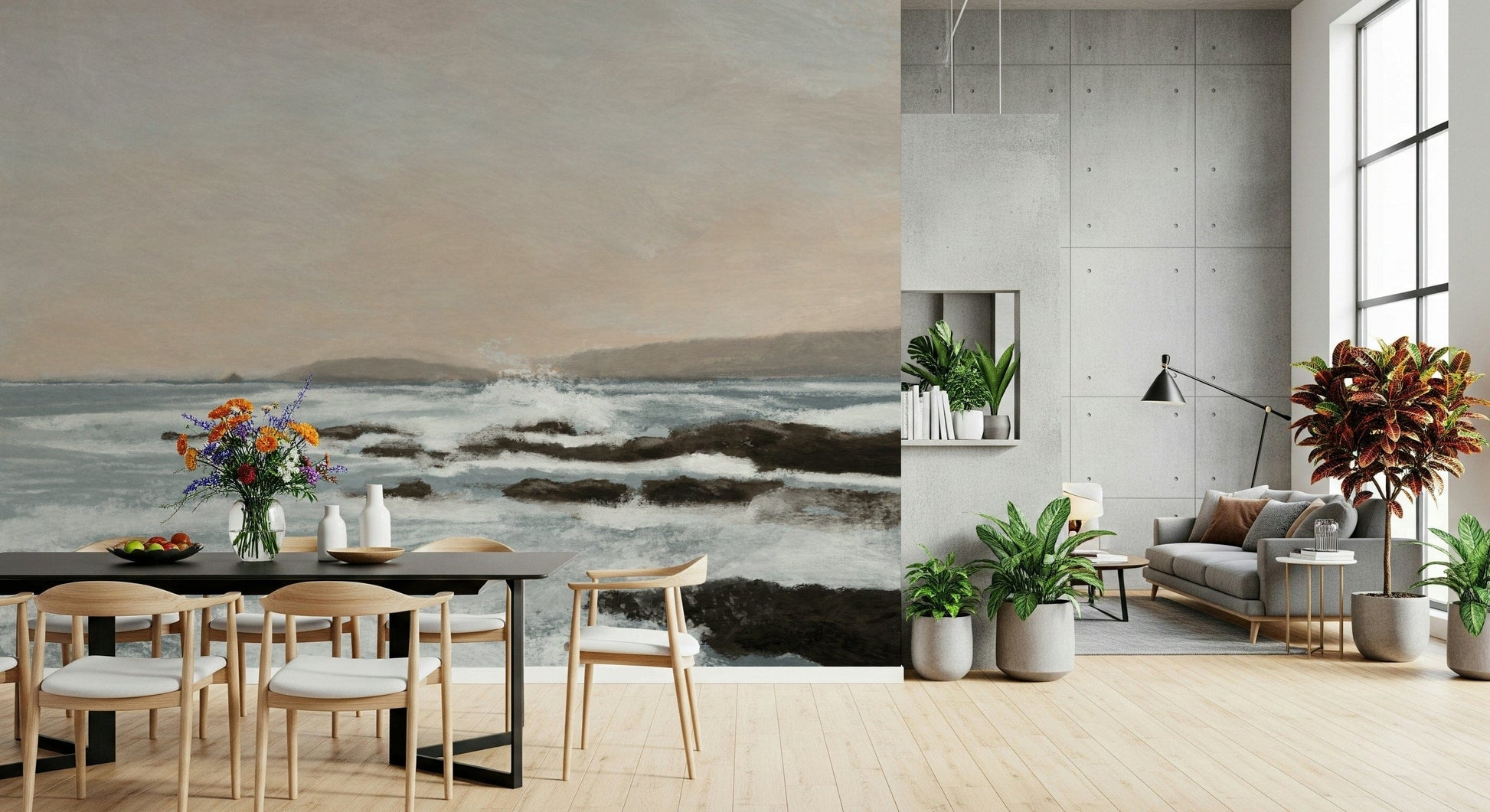 Coastal Hues wallpaper mural of waves breaking on rocks behind a black dining table and wood chairs in a dining room