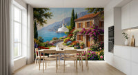 Coastal Cottage Bloom wallpaper mural of a stone cottage and sea view in a kitchen dining area with wood table