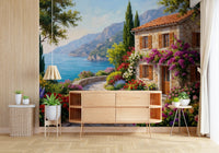 Coastal Cottage Bloom wallpaper mural with a seaside cottage and bougainvillea above a wood sideboard in a living room