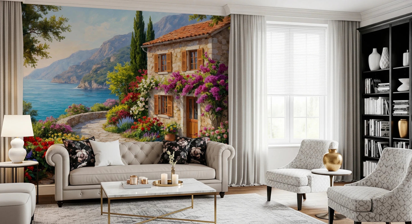 Coastal Cottage Bloom wallpaper mural of a coastal cottage above a cream chesterfield sofa in a living room