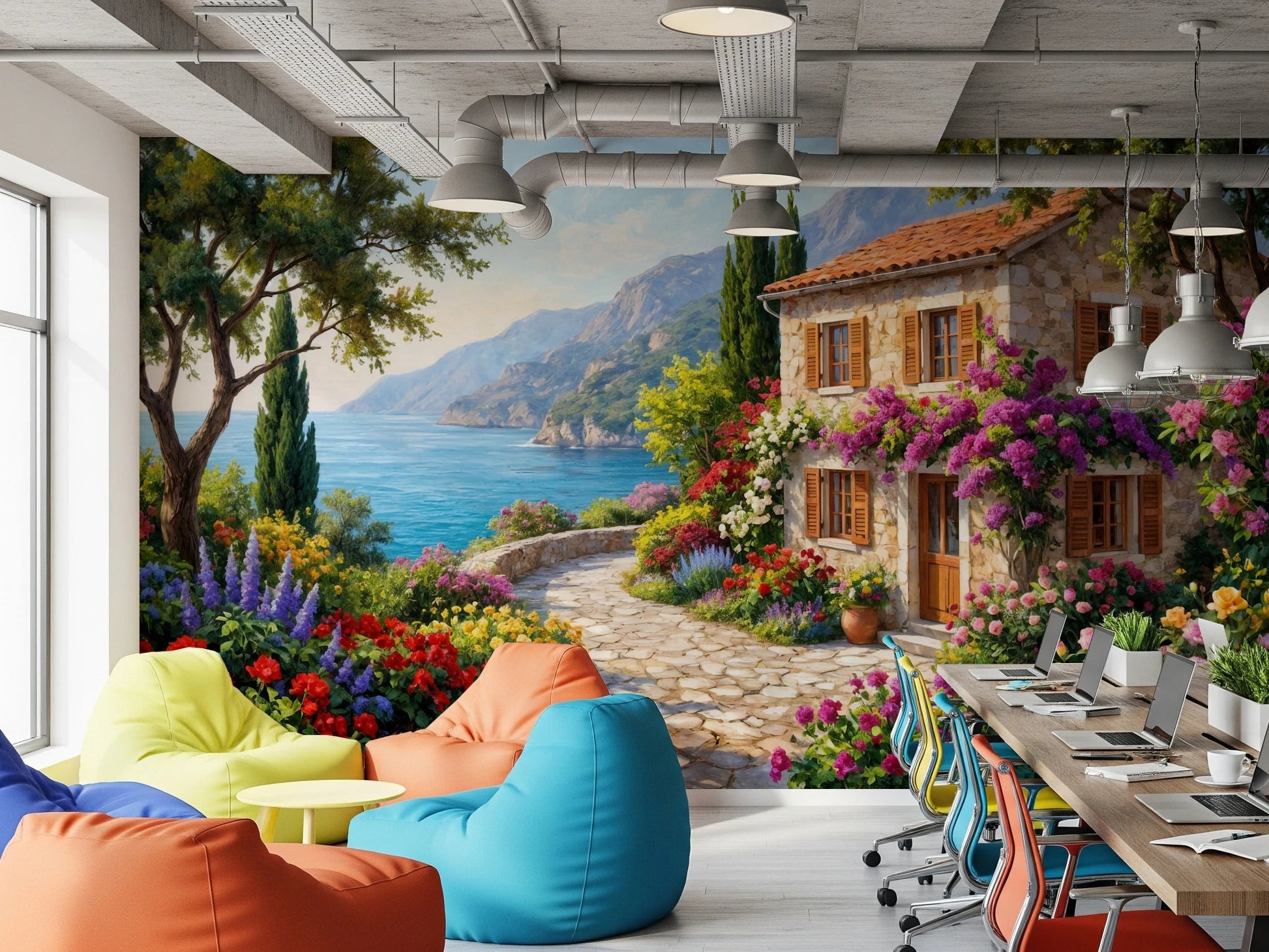 Coastal Cottage Bloom wallpaper mural with a Mediterranean house behind colorful bean bags in a home office