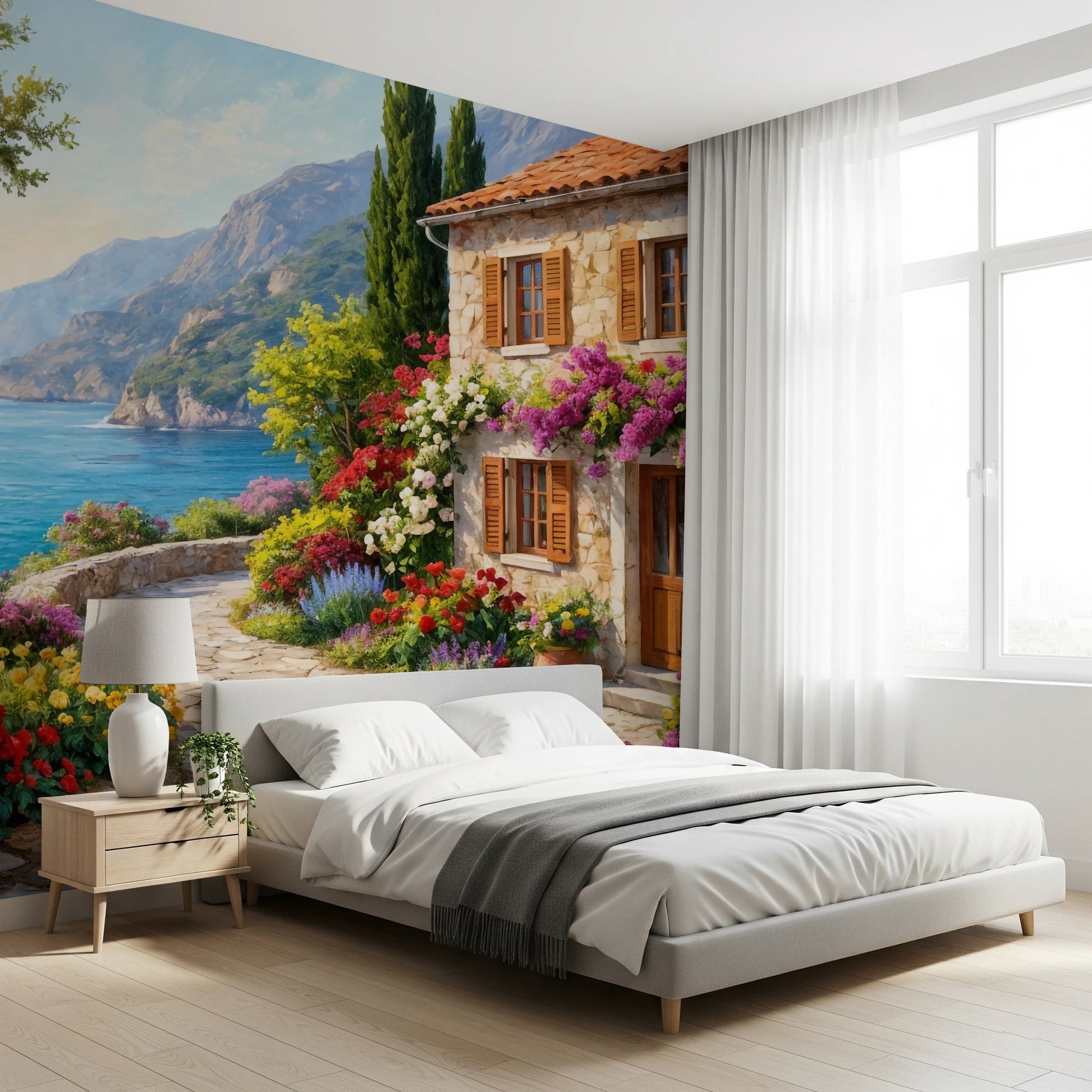 Coastal Cottage Bloom wallpaper mural with a Mediterranean house and bay in a bedroom with white platform bed